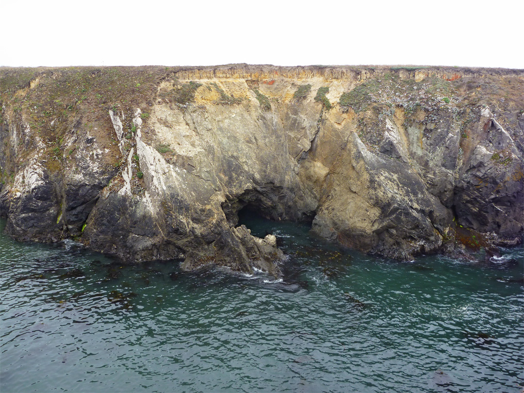 Cliffs around a cave