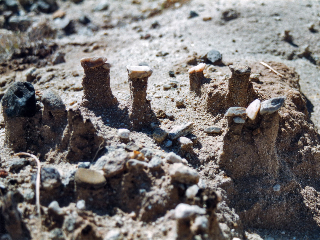 Pebbles on eroded sand