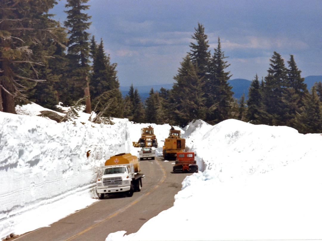 Snow plows clearing the road