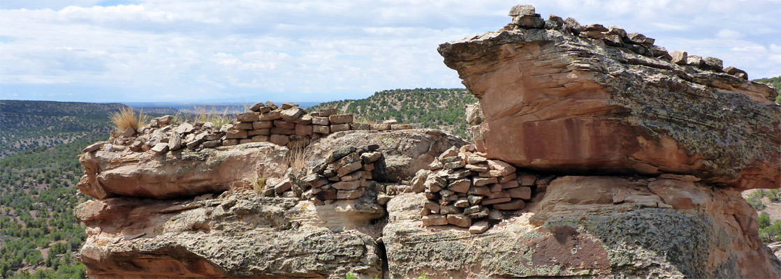 Ruins on a small butte, at Painted Hand Pueblo