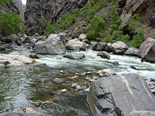 Huge rocks in the Gunnison River, just downstream of the Narrows