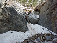 Boulder and snowdrift