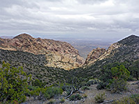 Upper end of a valley