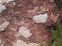 Flaking petroglyphs