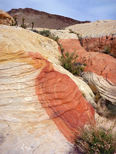 Wavy bands of red and orange