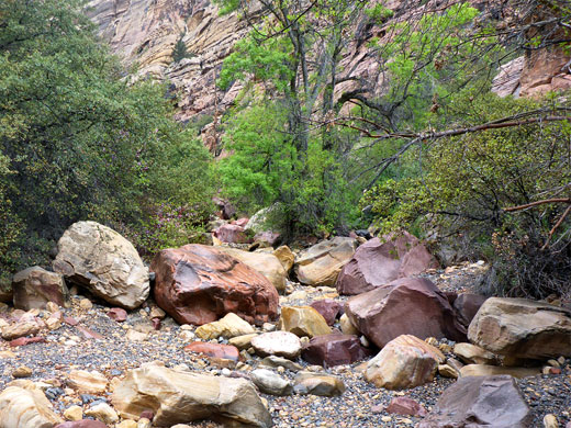 Colorful boulders and pebbles in the streambed