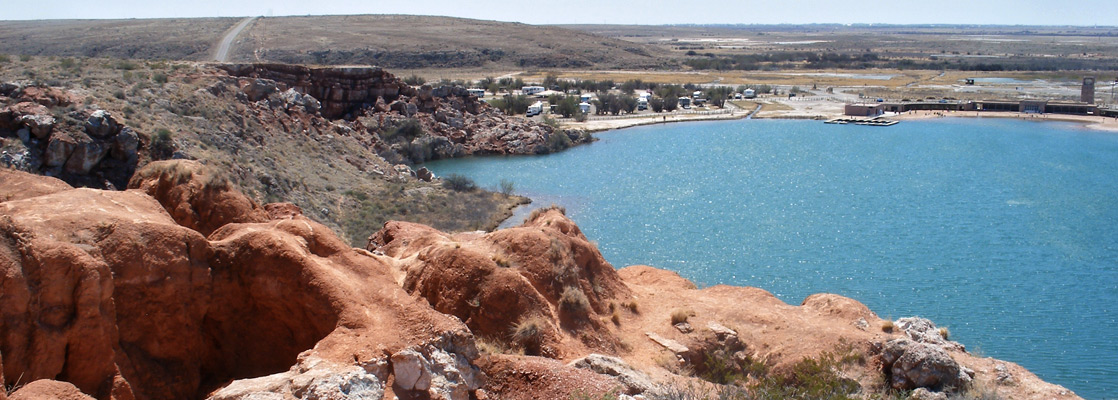 Red and white rocks above Lea Lake, at the edge of the escarpment