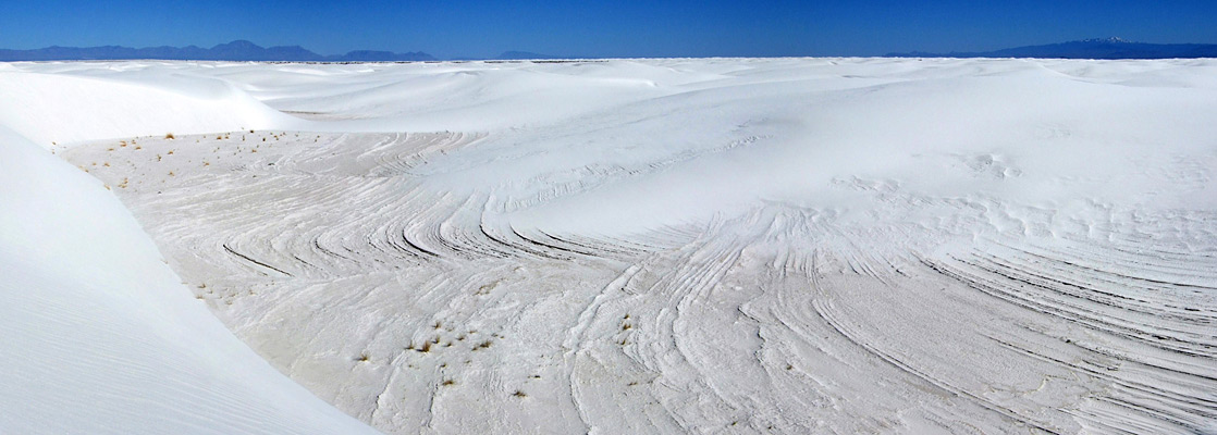 White dunes and ridges along the Alkali Flat Trail