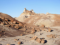 Boulders and mud hills