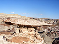 Bullet-shaped caprock