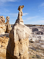 Thin spire on a wider column