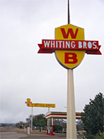 Signs at the Whiting Bros garage