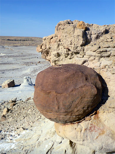 Spherical brown boulder