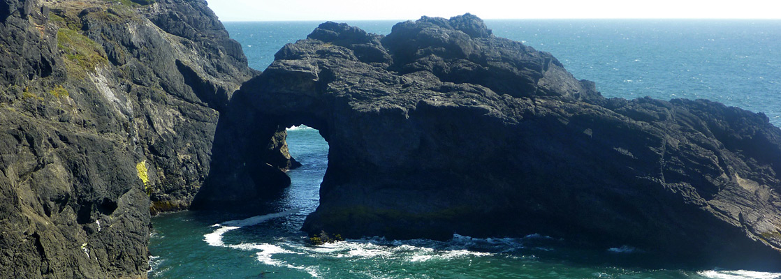 Arch south of Indian Sands, guarded by sheer cliffs
