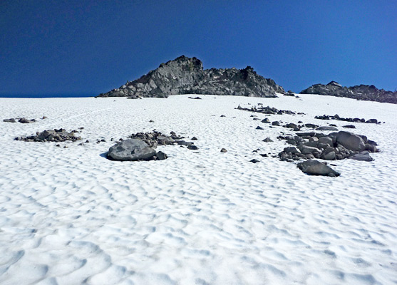 Dappled snowfield along the Watchman Trail