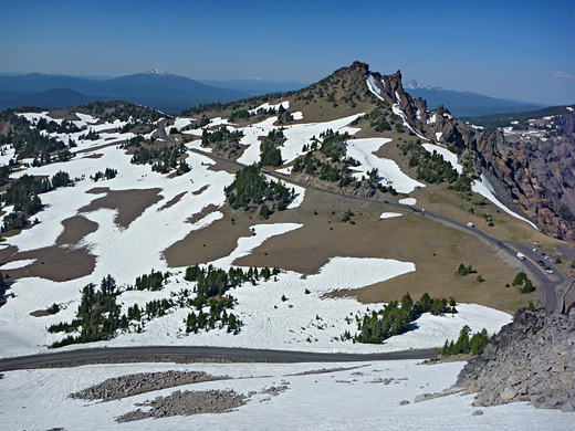 Patches of snow along the Rim Drive - view from Watchman Peak