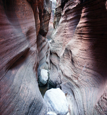 Narrows, boulders and a shallow pool