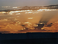 Sunset behind Leche-E Rock 