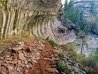 Streaked, curving cliff