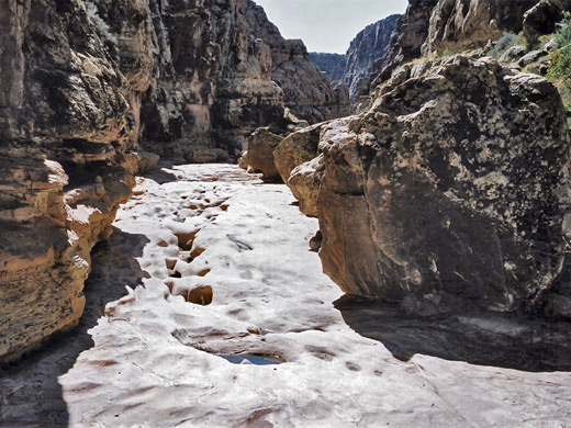 Water-carved channel