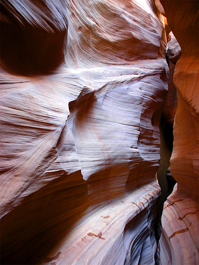 Thin narrows leading to a pool