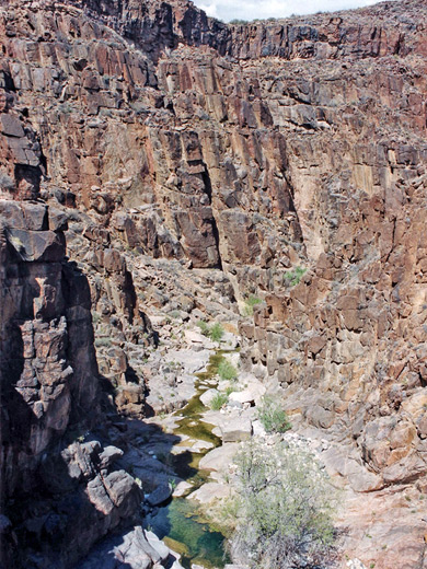 Shallow stream through the narrows of Milkweed Canyon