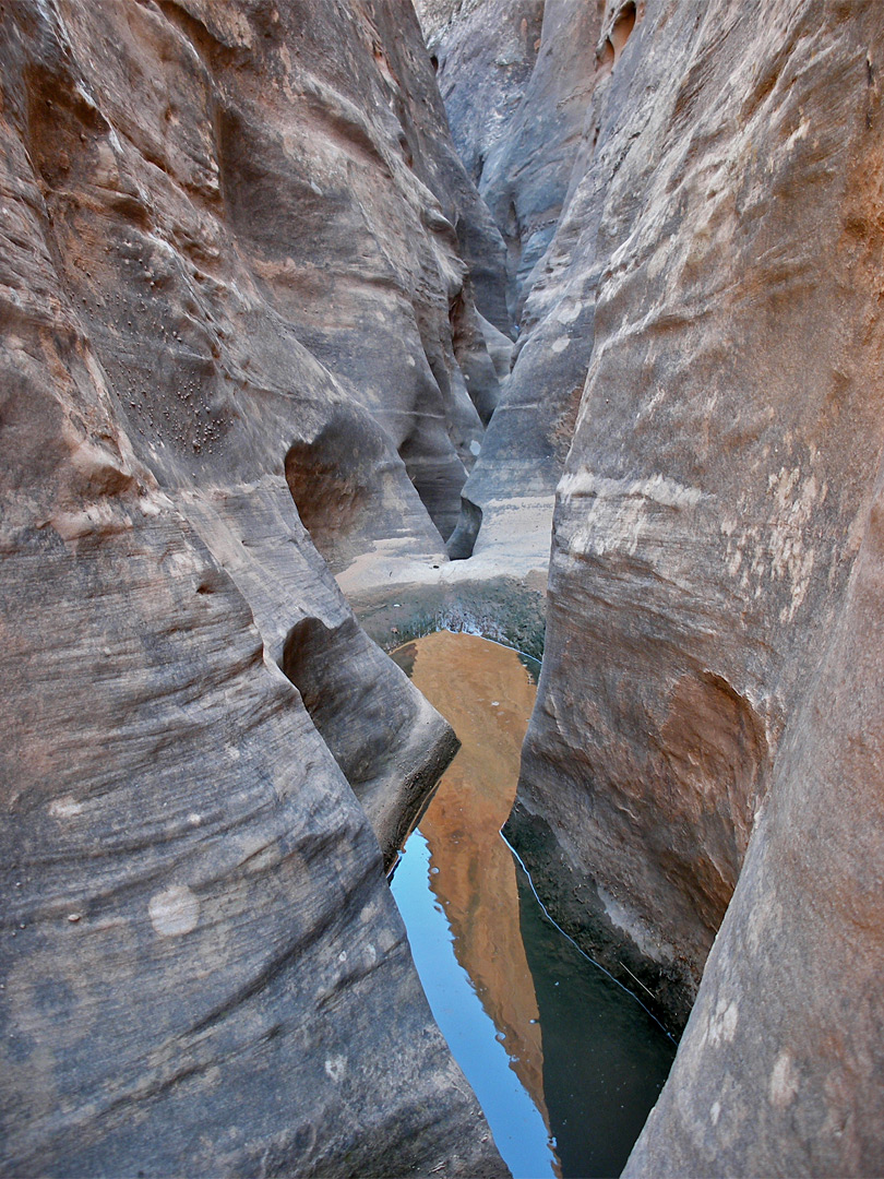 Pothole and curvy rocks