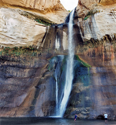 Hikers at the pool below Lower Calf Creek Falls