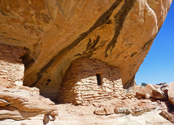 Well-preserved ruins in a sandstone alcove