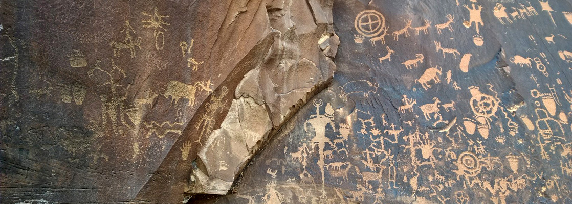 Wide view of the Newspaper Rock petroglyphs