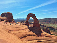 Sandstone bowl beside Delicate Arch