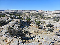 Slickrock below the plateau rim