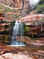 Waterfall and layered ledge