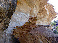 Broken wall and angular rocks