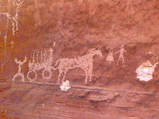 Horse and covered wagon petroglyph