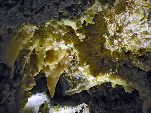 Small, pale orange stalactite