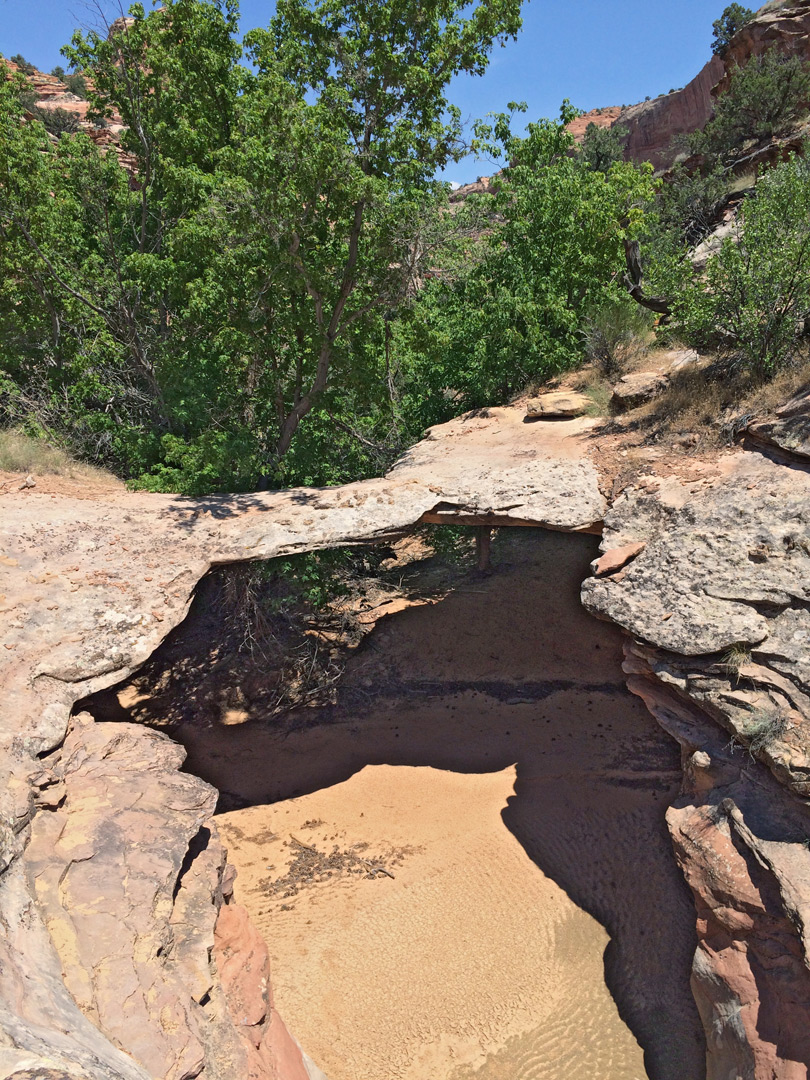 Sand below Maverick Natural Bridge