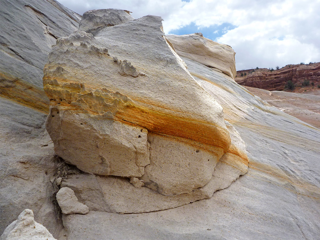 Boulder with orange layers