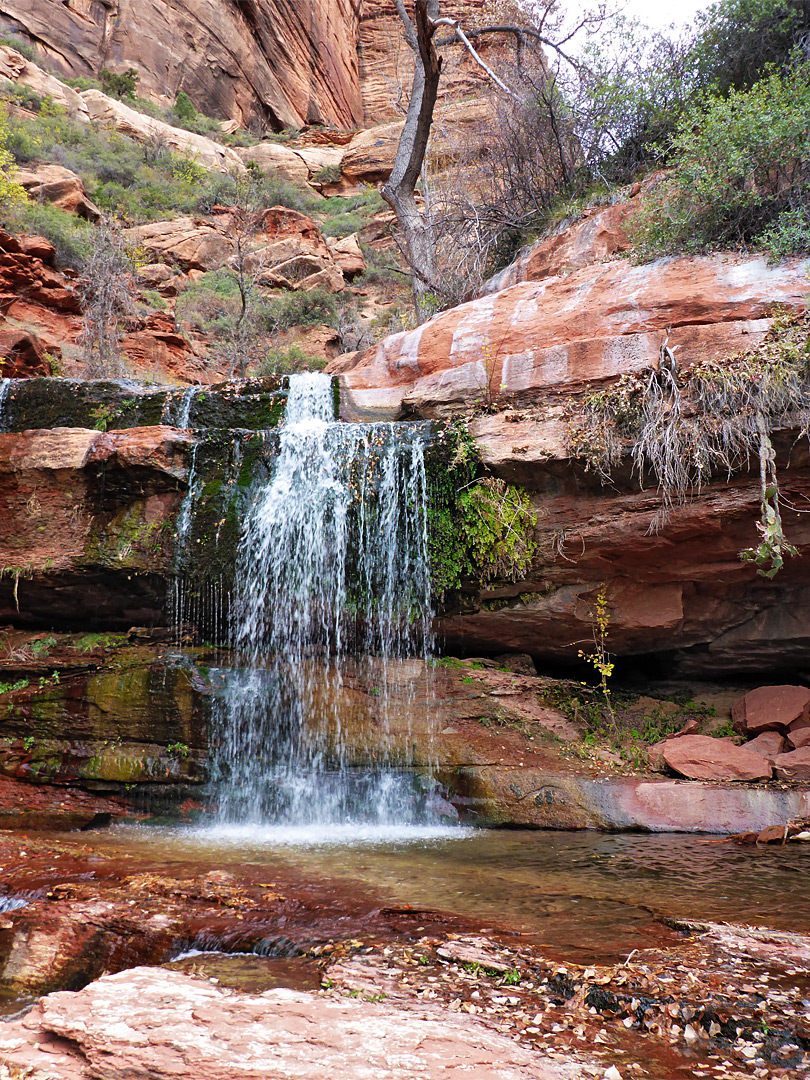 Waterfall and layered ledge