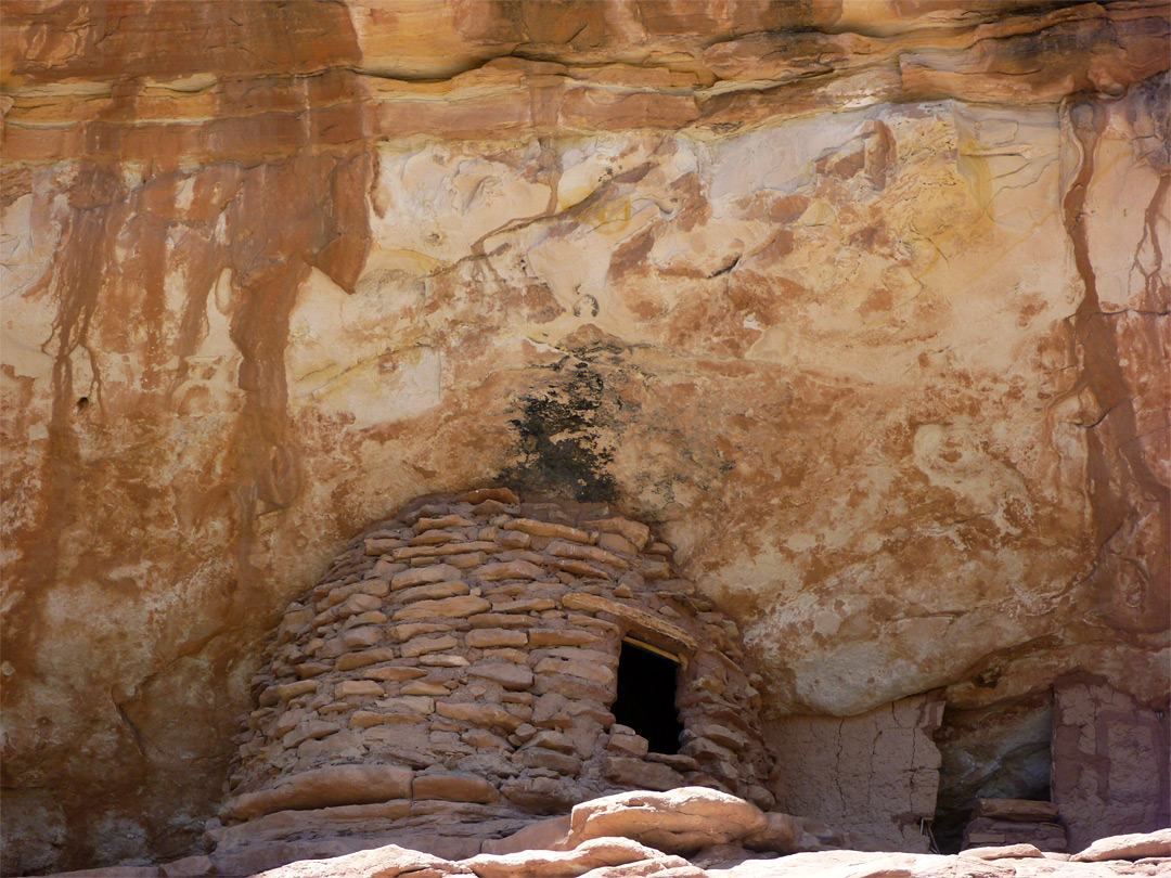 Streaked sandstone above a ruin