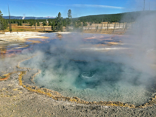 Steam above Firehole Spring